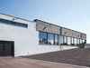 Die Vogelsang Holzbau AG aus Wohlen hat das Holztragwerk für die Sporthalle errichtet.